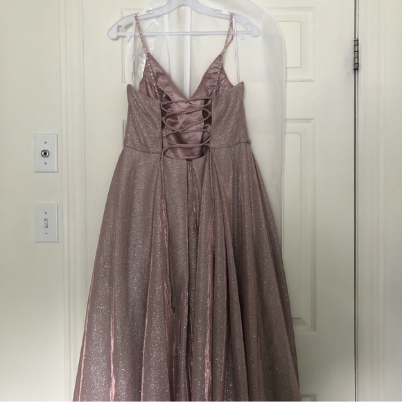 Evening dress , thin straps shiny slit infront very classy. Wore once - Picture 4 of 5